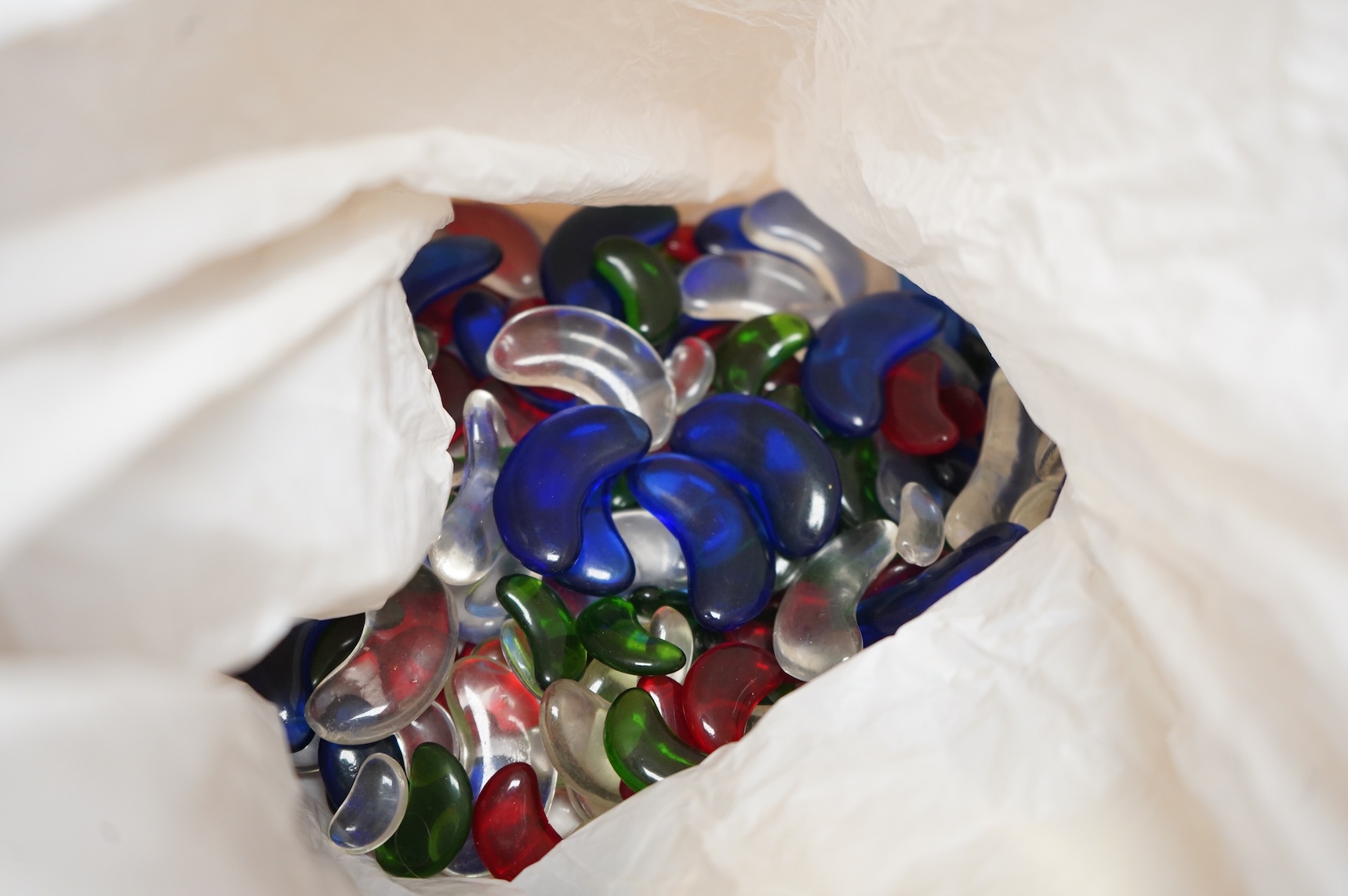 A group of assorted costume jewellery, glass beads etc.